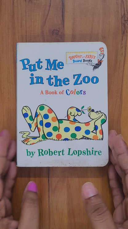 Put me in the zoo a book of colours boardbook excellent condition