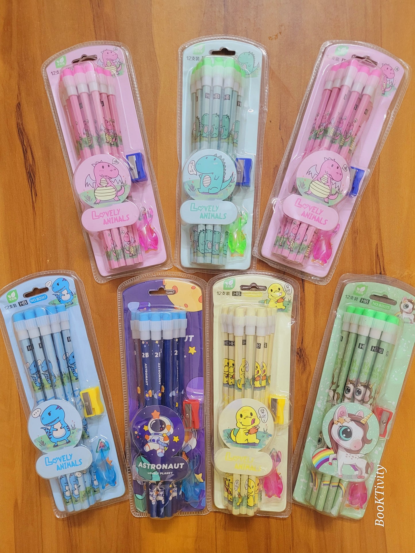 12 HB pencils with erasers on the top sharpner and pencil holder one set