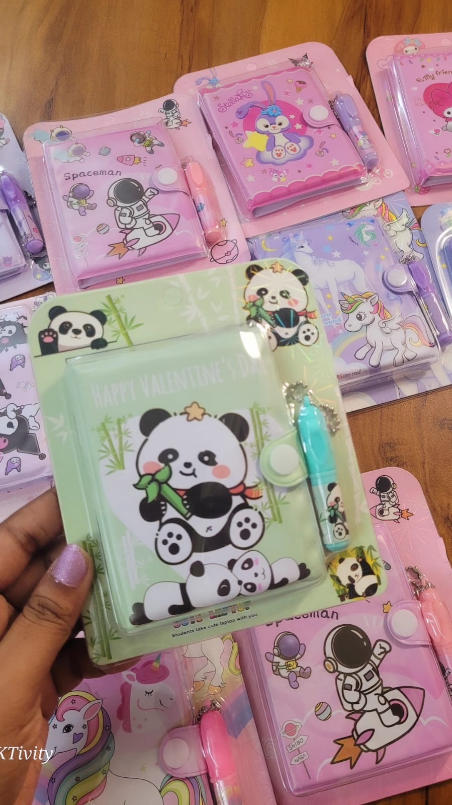 Soft plushy printed pages notebook with a cute keychain pen best for return gifts